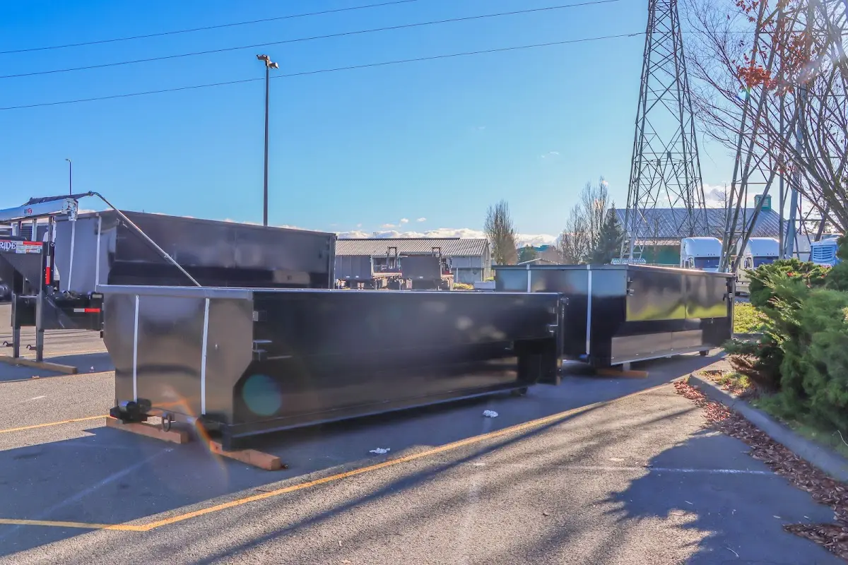 Roll-off dumpster ready for waste disposal at job site for Roofing Dumpster Rental in Helena-West Helena